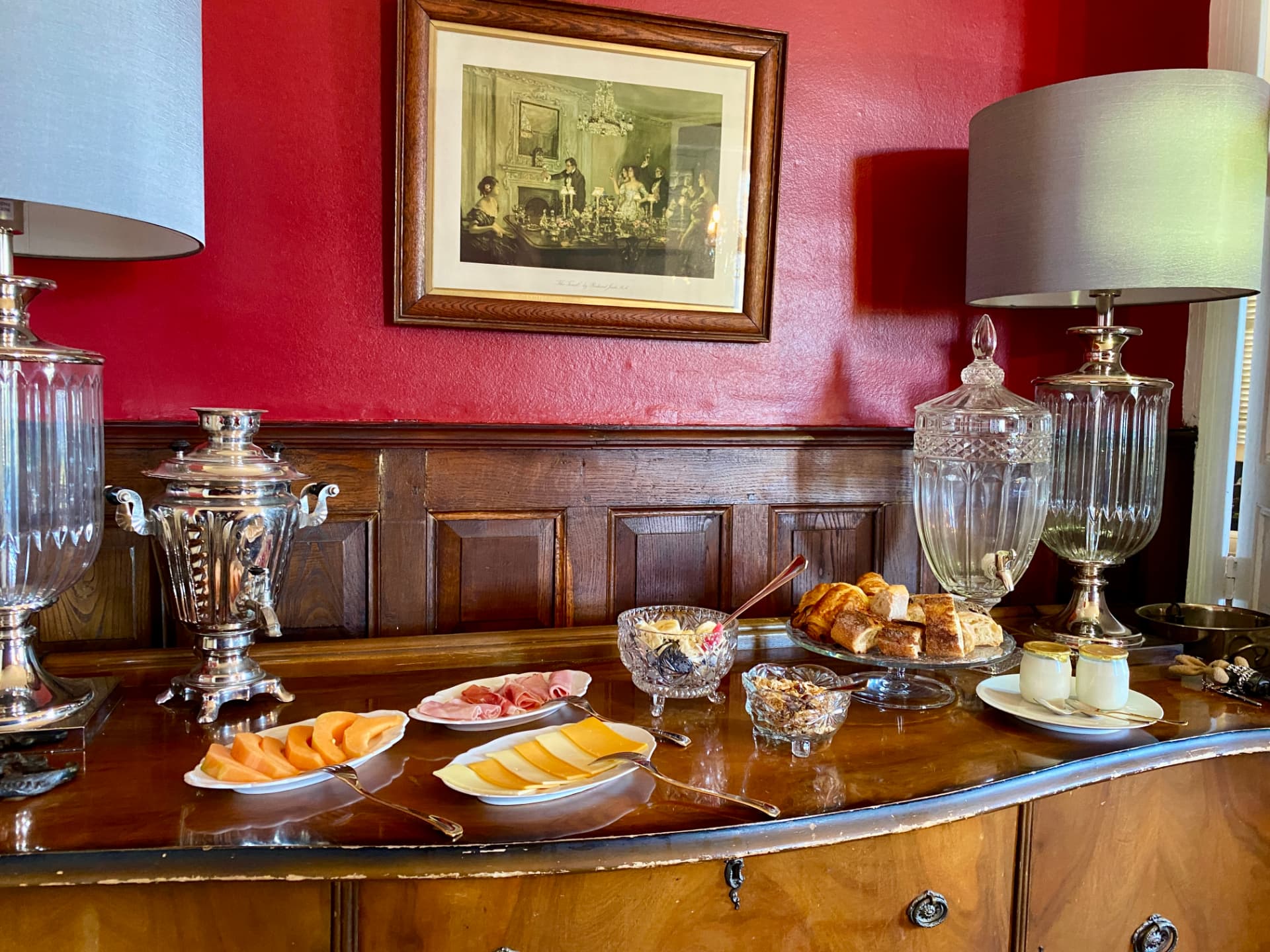 A generous breakfast laid out on the sideboard in the château's dining room